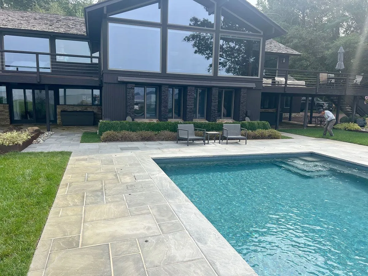 A large house with a large swimming pool